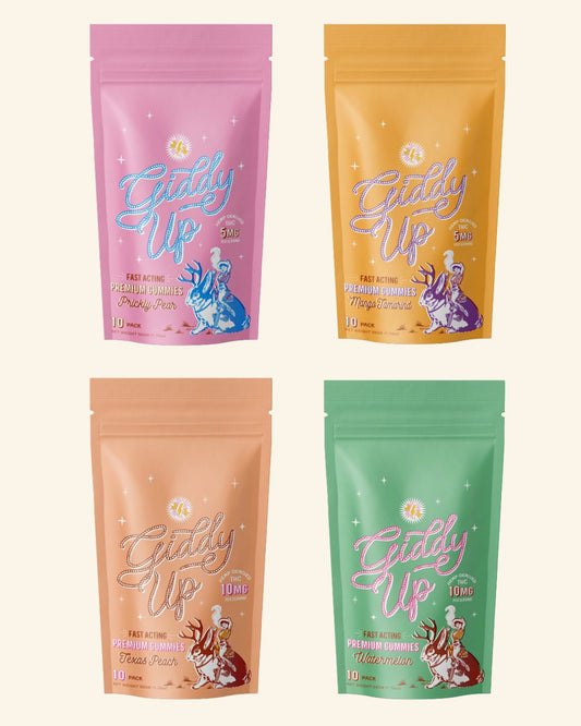 Four colorful packages of 'Giddy Up Gummies' 